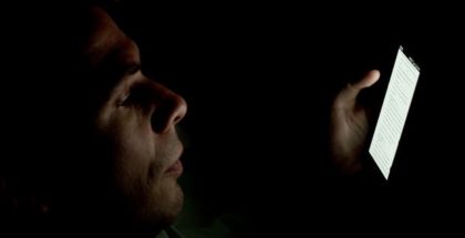 "Person looking at smartphone in the dark" (CC BY-SA 2.0) by Japanexperterna.se
